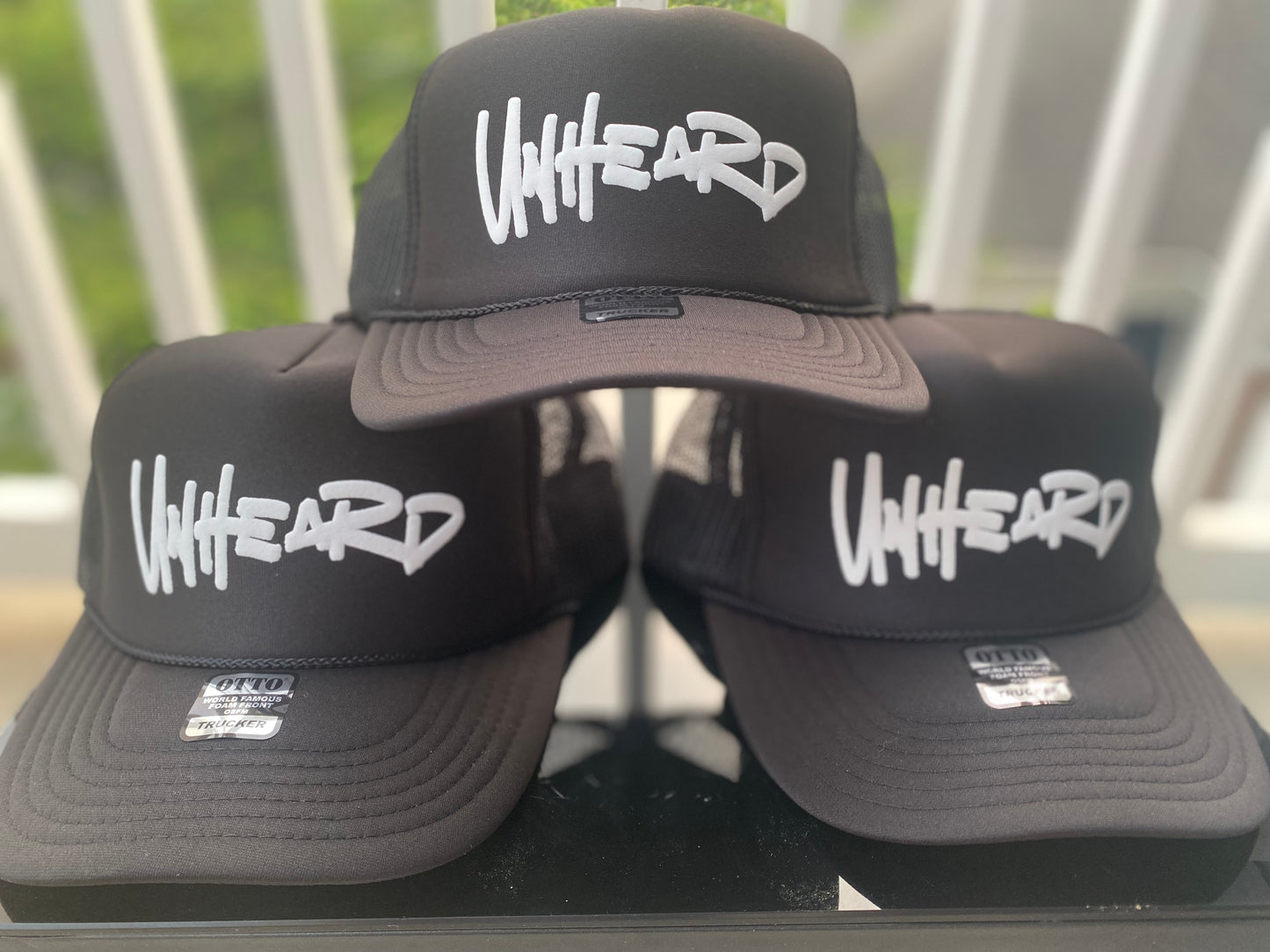 Unheard black logo hat