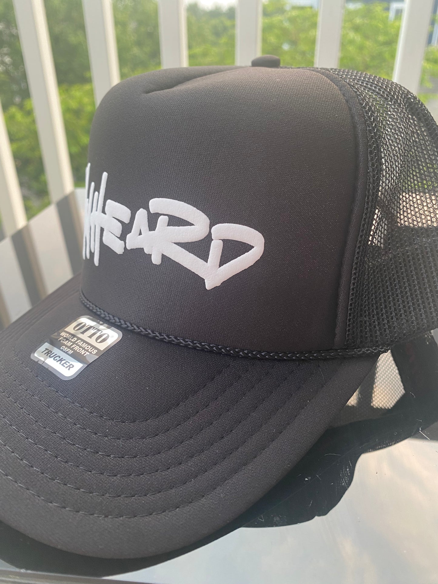 Unheard black logo hat