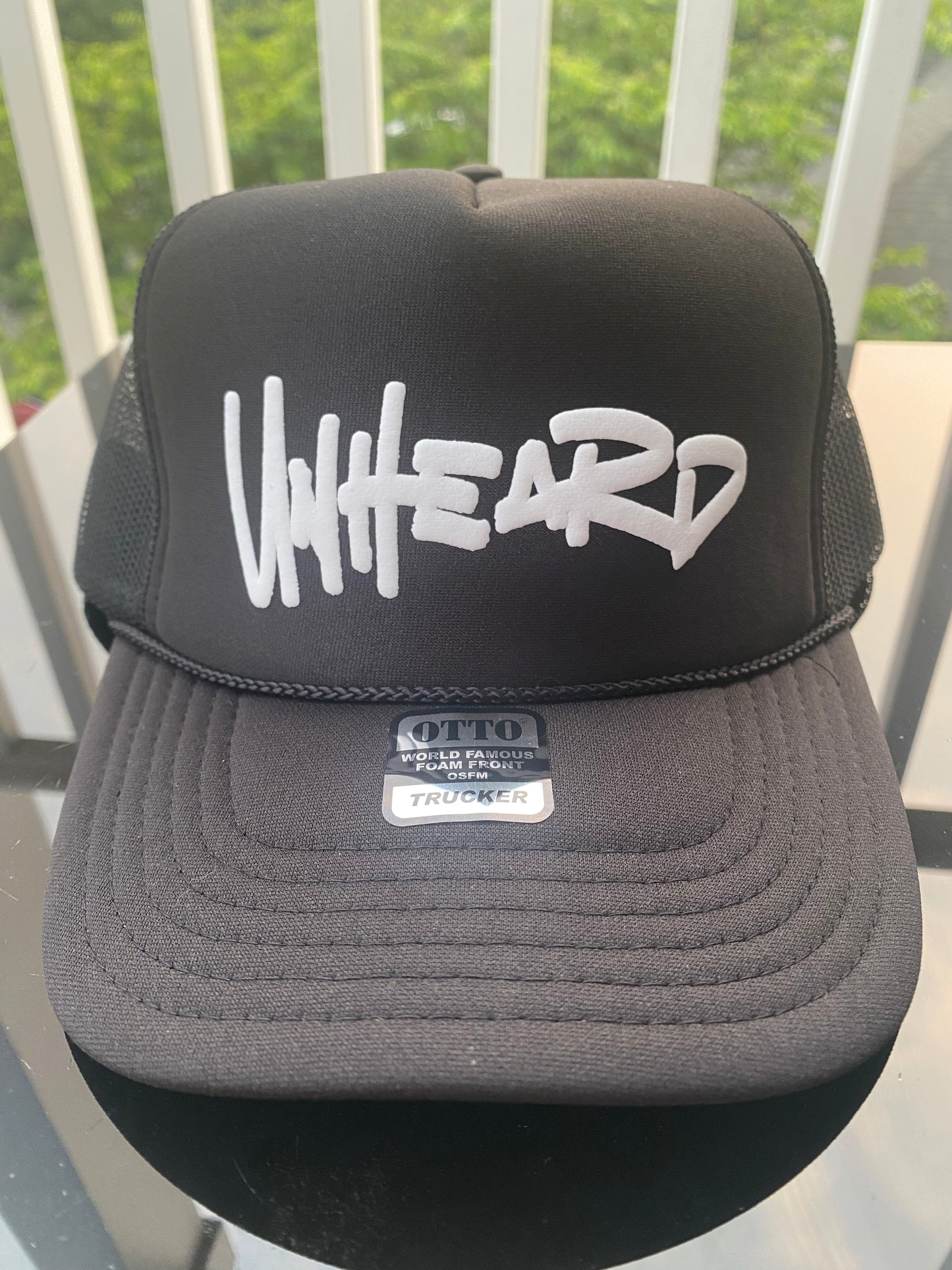 Unheard black logo hat